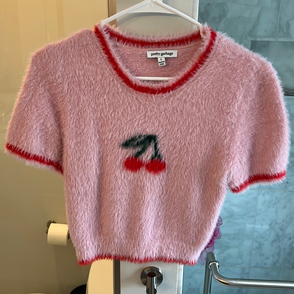 Short sleeved fuzzy sweater